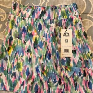 RBX brand women’s skort. Multi colored. Sz xs New with tags